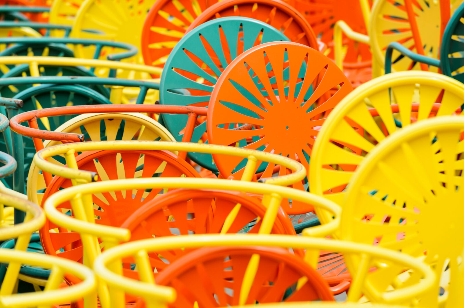 Kicking off the spring-season opening of the Memorial Union Terrace at the University of Wisconsin-Madison, volunteers help carry out the Wisconsin Union's iconic sunburst chairs to the Terrace on April 13, 2017. The Terrace chairs and tables are stored off site during the winter months.