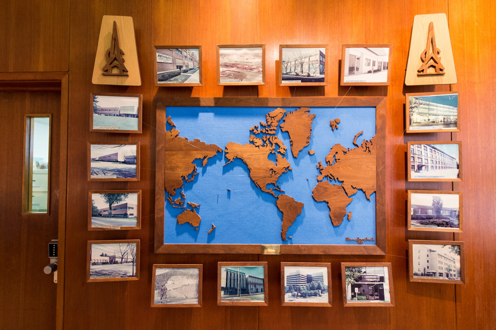 On April 20, 2015, a display in the lobby of Astronautics Corporation of American depicts the origins of the aviation instrument manufacturer in Milwaukee, Wis. The family company was founded in 1959 by Nate Zelazo -- who holds a 1957 master's degree in mechanical engineering from the University of Wisconsin-Madison -- and continues to employee a number of UW-Madison graduates. (Photo by Jeff Miller/UW-Madison)
