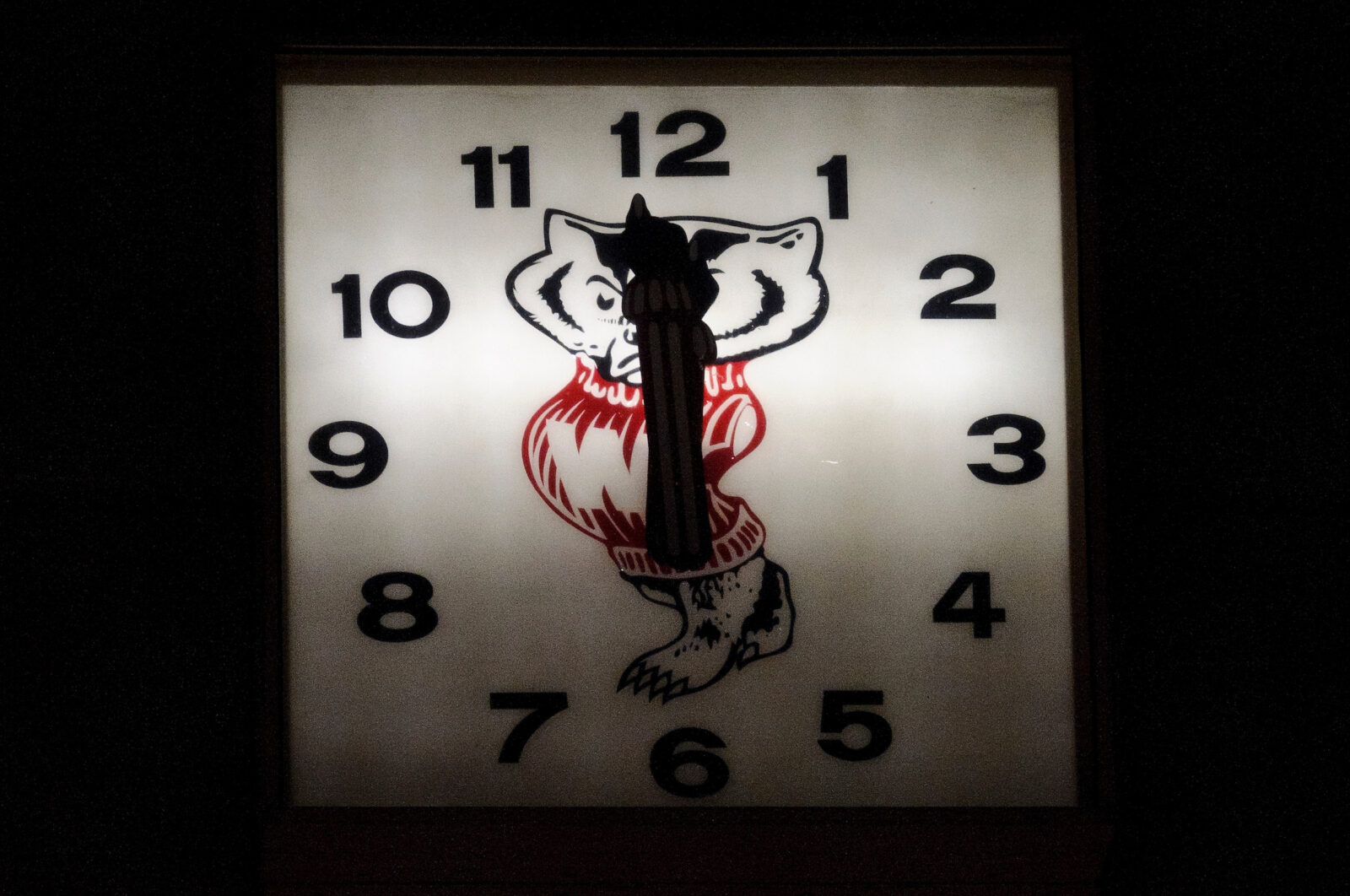 The Bucky Badger clock on the exterior of 21 North Park marks the time at 11:59PM on Wednesday, April 1, 2012.