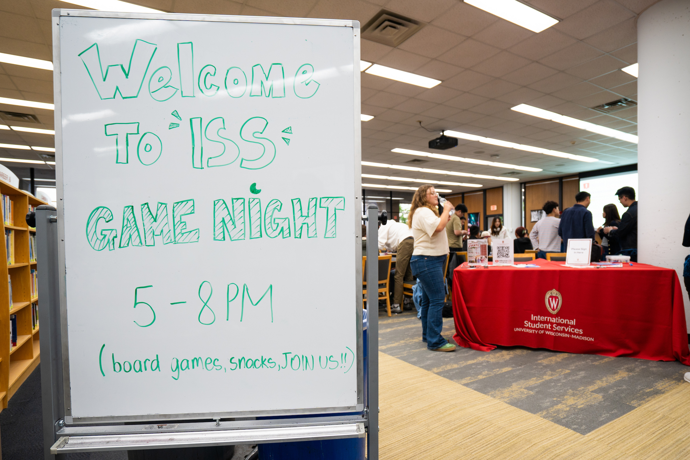 A billboard at the International Student Game night happening at the College Library at the University of Wisconsin–Madison on Sept. 4, 2025. (Photo by Xiaomeng Shen / UW–Madison)